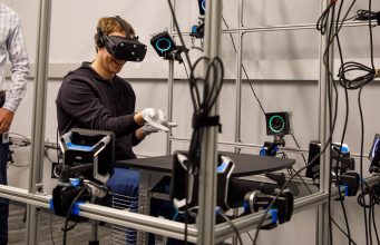 Facebook CEO Mark Zuckerberg tours Oculus research lab